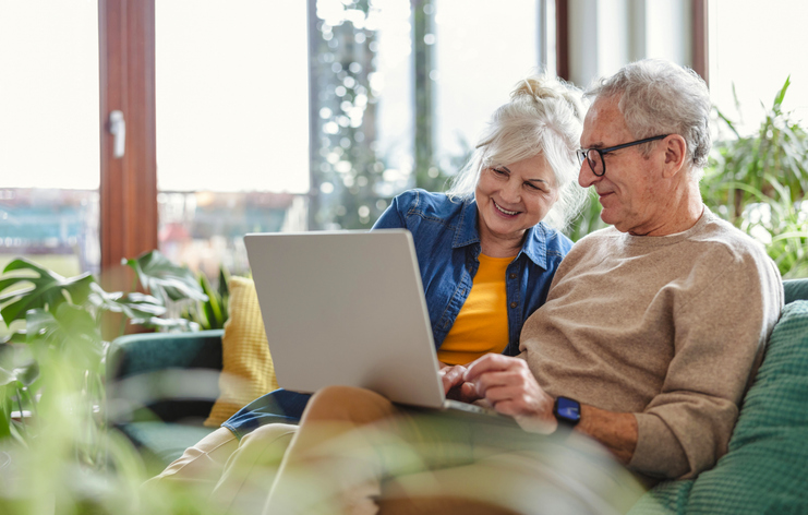 A senior couple reviewing their retirement plan.